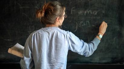 school services near syracuse ny panel image for secny fcu teacher using the green chalkboard to teach