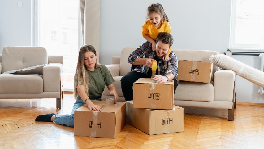 mortgage loans near syracuse ny image of happy family packing up home to move