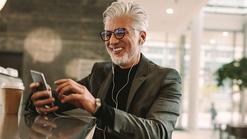 Man happy on phone