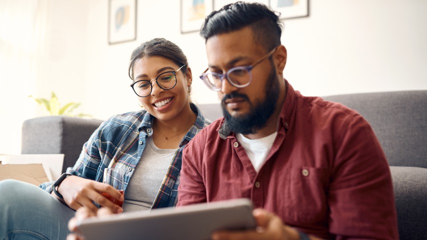 member survey near syracuse ny image of happy married couple looking at computer