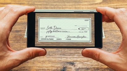 Mobile Banking App near syracuse ny panel image of a check with numbers addressed to sra for 50.00