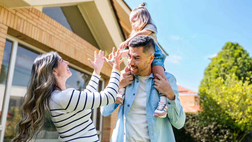 first time homebuyer programs near syracuse ny couple with daughter in front of new home